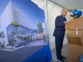 President and Vice-Chancellor of the University of Windsor, Robert Gordon, gives remarks during a press event marking the naming of the new athletic centre p the Toldo Lancer Centre, outside the facility on Tuesday, March 29, 2022.