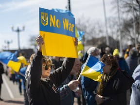 WINDSOR, ONTARIO:. MARCH 6, 2022 - As the war rages in Ukraine, members of Windsor's Ukrainian community and supporters held a third rally on Ottawa Street, on Sunday, March 6, 2022.