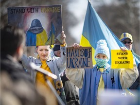 Members and supporters of Windsor's Ukrainian community are shown at a rally on Ottawa Street on Sunday, Feb. 27, 2022, held to protest Russia's military invasion of Ukraine.