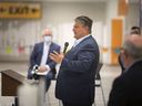 Windsor Regional Hospital CEO David Musyj expresses thanks to all behind the mass COVID-19 vaccination site at the Devonshire Mall. Windsor Mayor Drew Dilkens looks on. Photographed March 29, 2022.