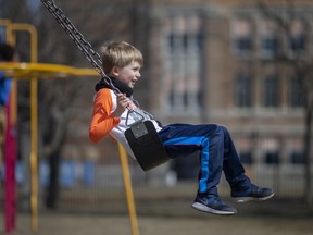 Caspian O'Brien, 9, enjoys the spring-like temps while on the swing at Wililstead Park, on Wednesday, March 16, 2022.
