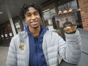Lorenzo Barbieri, an athlete on the Lancer men's basketball team, holds his video he recorded for With1Voice — an anti-racism initiative started by the team's assistant coach, Paul Ekeocha, on Thursday, March 31, 2022.