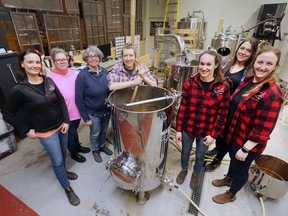 Windsor's only female commercial beer brewer invited other ladies in the wine and distilling business to celebrate  International Women's Day by producing a batch of brew together at Chapter Two Brewing Company in Windsor on Tuesday, March 8, 2022. From left to right, Tanya Mitchell, winemaker at Sprucewood Shores Estate Winery, Marianne Magee, vice-president of Pink Boots Society Canada, Cheryl Watson, co-owner Chapter Two Brewing Co., Tammy Joho, Chapter Two brewer, Lauren Brush, assistant winemaker at Colio Estate Winery, Aislin Henrickson, distiller at Wolfhead Distillery and  Allison Christ, Colio Estate Winery are shown during the process.