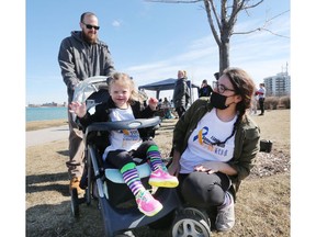 Chris and Kristine Kearns and their daughter Kennedy, 2, are shown at the World Down Syndrome Day walk in Windsor on Sunday, March 20, 2022.