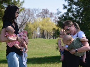 Staci Pinkerton (left) with twins Lillian and Sienna and Danielle Friest (right) with twins Jack and Charlotte. Both women are part of Fertility Friends, a peer support group for women struggling with infertility ? and who gathered with other women on Saturday, April 23, 2022 to celebrate their ?miracle babies.