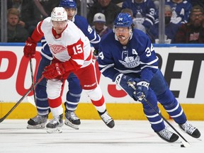 Auston Matthews of the Toronto Maple Leafs controls the puck against the Detroit Red Wings during an NHL game at Scotiabank Arena on April 26, 2022 in Toronto, Ontario.