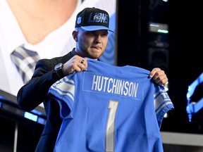Aidan Hutchinson poses onstage after being selected second by the Detroit Lions during round one of the 2022 NFL Draft on April 28, 2022 in Las Vegas, Nevada.