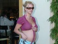 Mom-to-be Britney Spears reveals her growing stomach with a sexy outfit in Malibu June 27, 2005 in Malibu.