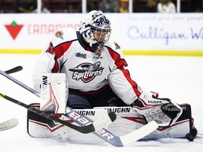 Windsor Spitfires overage goalie Matt Onuska made 30 saves to pick up the win in his exhibition debut on Tuesday in a 7-4 win over the Flint Firebirds.