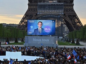 France's incumbent president Emmanuel Macron defeated his far-right rival Marine Le Pen for a second five-year term as president on Sunday, April 24, 2022 in Paris.