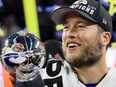 Los Angeles Rams' Matthew Stafford celebrates with the Vince Lombardi Trophy after winning Super Bowl LVI at SoFi Stadium in Inglewood, Calif., Feb. 13, 2022.