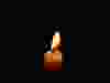Berlin, Germany - October 12, 2013: Candle in the dark