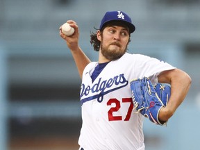 Trevor Bauer of the Los Angeles Dodgers throws the first pitch in the first inning against the San Francisco Giants at Dodger Stadium on June 28, 2021 in Los Angeles, Calif.