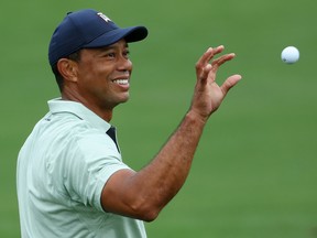 AUGUSTA, GEORGIA - APRIL 05: Tiger Woods of the United States warms up on the range during a practice round prior to the Masters at Augusta National Golf Club on April 05, 2022 in Augusta, Georgia. (Photo by Andrew Redington/Getty Images)