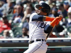 Detroit Tigers shortstop Javier Baez hits an RBI double in the third inning against the Boston Red Sox at Comerica Park.