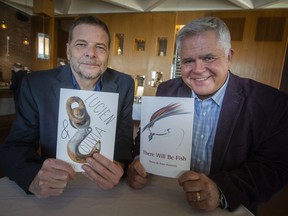 Local authors, Andre Narbonne, left, with his novel Lucien & Olivia, and Peter Hrastovec, with his book of poems, There Will Be Fish, are pictured at joint book launch at the Windsor Club, on Wednesday, April 27, 2022.
