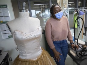 Cynthia Okpala, a student in the Fashion Design Technician Program at St. Clair College displays a look from her final collection before the upcoming Atelier Fashion Show, on Tuesday, April 19, 2022.