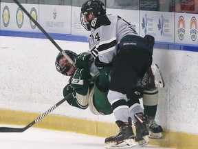 LaSalle Vipers' forward Jake Eaton, right, levels St. Marys Lincolns' forward Noah Vandenbrink with a hit during Sunday's game at the Vollmer Complex.