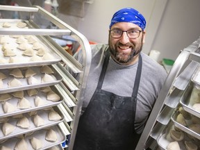 Rob Myers, co-owner of Little Foot Foods, is pictured with trays of freshly made perogies, while at their Tecumseh Road East location, on Tuesday, April 26, 2022.  The business is expanding into a 5,000 square foot facility in Oldcastle.