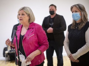 Andrea Horwath, Ontario NDP leader, is joined by Lisa Gretzky, and Taras Natyshak, during a press event on mental health funding at Mackenzie Hall Cultural Centre, on Monday, April 4, 2022.
