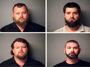 A combination of Antrim County Sheriff's Office police mugshots shows William Null, Eric Molitor, Michael Null and Shawn Fix, four of thirteen men arrested on October 7, 2020 on charges of conspiring to kidnap the Michigan governor, attack the state legislature and threaten law enforcement.