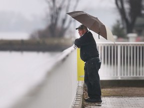 Ken Parent takes a break from a walk at the Kiwanis Park in Windsor on a rainy Wednesday, April 6, 2022.
