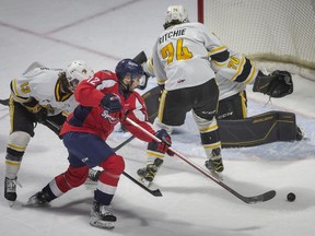 Windsor Spitfires' centre Ryan Abraham fails to get his stick on the puck for a scoring chance in front of the Sarnia net during Saturday's game at the WFCU Centre.