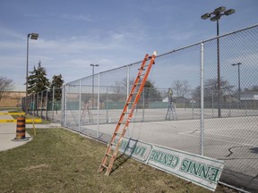 Work begins on the improvements to the tennis courts at Forest Glade Park, on Monday, April 11, 2022.