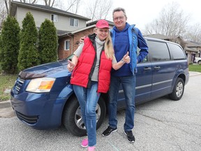 Olga and Volodymyr Petrenko pose with a minivan that was gifted to them recently. The Ukrainian couple left their war torn country about a month ago. They are living with their daughter in LaSalle.