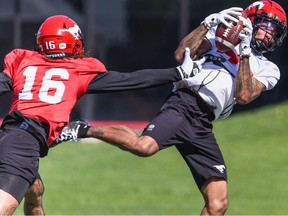Calgary Stampeders Javien Hamilton, left, and Brendan Langley and during team practice at McMahon Stadium on Monday, May 23, 2022.