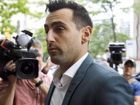 Singer Jacob Hoggard arrives at a Toronto courthouse for the second day of his preliminary hearing on July 12, 2019 in Toronto.