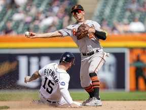 Tucker Barnhart of the Detroit Tigers is out at second against Ramon Urias of the Baltimore Orioles during the bottom of the seventh inning at Comerica Park on May 15, 2022 in Detroit, Michigan.