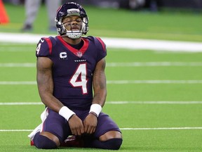 Deshaun Watson of the Houston Texans reacts to a play during a game against the Tennessee Titans at NRG Stadium on January 03, 2021 in Houston, Texas.