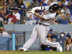 Tucker Barnhart of the Detroit Tigers hits an RBI double during the eighth inning against the Los Angeles Dodgers at Dodger Stadium on April 30, 2022 in Los Angeles, California.