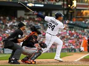 Miguel Cabrera of the Detroit Tigers hits a RBI double in the third inning against the Baltimore Orioles at Comerica Park on May 13, 2022 in Detroit, Michigan.