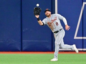 Robbie Grossman of the Detroit Tigers looks to catch a fly ball off the bat of Wander Franco #5 of the Tampa Bay Rays in the third inning at Tropicana Field on May 16, 2022 in St Petersburg, Florida.