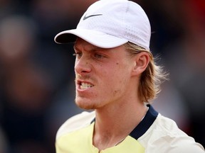 Denis Shapovalov of Canada reacts against Holger Rune of Denmark during the Men's Singles First Round match on Day 3 of the French Open at Roland Garros on May 24, 2022 in Paris, France.