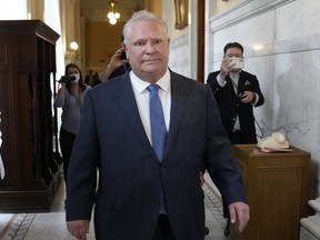 Ontario Premier Doug Ford walks towards Lt.-Gov. Elizabeth Dowdeswell's office at Queen's Park in Toronto, Tuesday, May 3, 2022 to officially start the provincial election period.