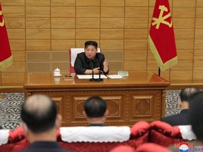This picture taken on Saturday, May 21, 2022 and released from North Korea's official Korean Central News Agency shows North Korean leader Kim Jong Un attending a meeting at The Political Bureau of the Central Committee of the Workers' Party of Korea at the headquarters of the party's Central Committee in Pyongyang.