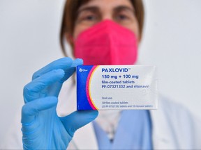 Dr. Cesira Nencioni, director of infectious diseases at Misericordia hospital, holds COVID-19 treatment pill Paxlovid, in Grosseto, Italy, Feb. 8, 2022.