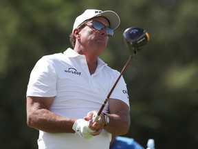 Phil Mickelson tees off during a practice round prior to the PIF Saudi International at Royal Greens Golf & Country Club on February 2, 2022 in Al Murooj, Saudi Arabia.