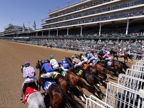 Horses break from the starting gate during one of the races at Churchill Downs in Louisville, Ky., on May 1, 2021.