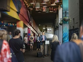 MP Irek Kuzmierczyk speaks during the unveiling of phase one of Art Alley, located north of Maiden Lane, between Pelissier Street and Ouellette Avenue, on Thursday, May 27, 2022.