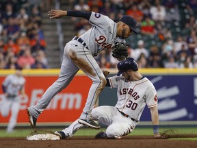 Houston Astros right fielder Kyle Tucker is out as Detroit Tigers second baseman Harold Castro fields a throw during the seventh inning at Minute Maid Park.