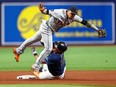 Tampa Bay Rays first baseman Ji-Man Choi collides with Detroit Tigers shortstop Javier Baez in the fourth inning at Tropicana Field.
