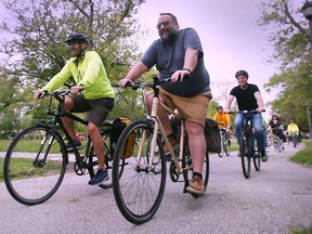 Cyclists participate in the Bike to Work Day event in Windsor on Friday, May 20, 2022.