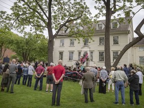 People gathered to celebrate the lease agreement between the City of Windsor and the Ontario Heritage Trust which will provide for regular public access to the Duff Baby Mansion, on Wednesday, May 25, 2022.