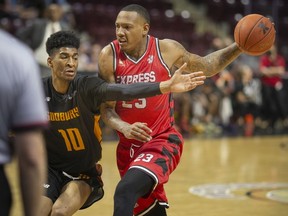 Windsor Express forward Billy White drives past Sudbury's Tyrell Gumbs-Frater during Friday's National Basketball League of Canada game at the WFCU Centre.