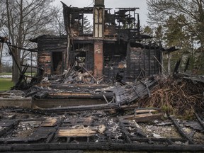 The charred remains of an overnight house fire on the 800 block of Iler Road, north of County Rd. 50 in Harrow, are seen on Thursday, May 5, 2022.  No injuries were reported.