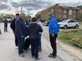 Doug Ford made a stop in Uxbridge on May 23, 2022 where residents were clearing debris and repairing damage caused by Saturday's deadly storm.